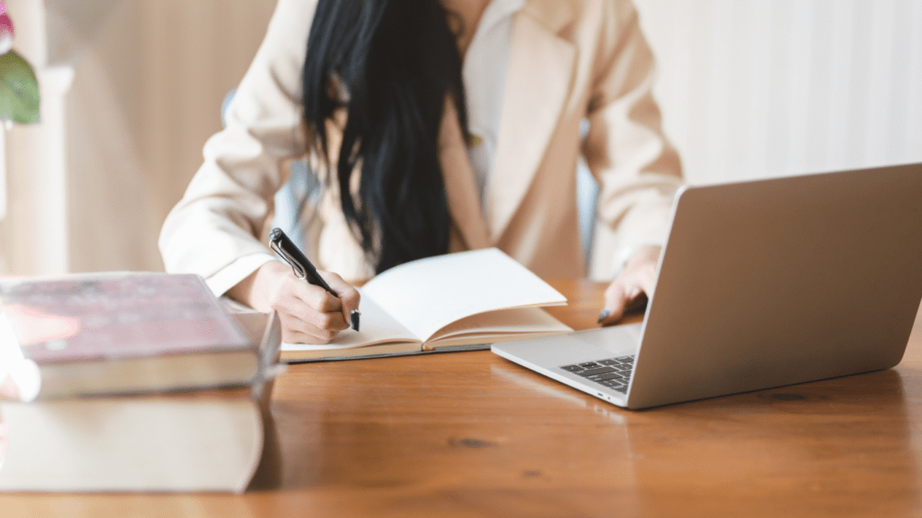 a woman writing a blog