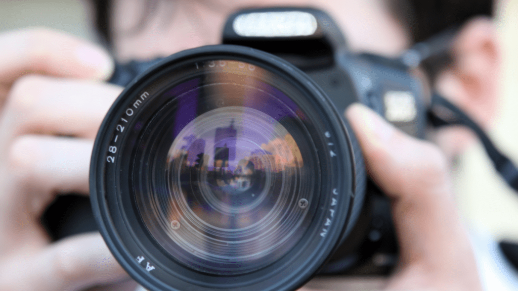 a man holding a camera