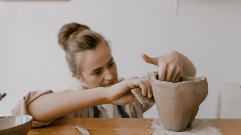 a woman in sculpting class