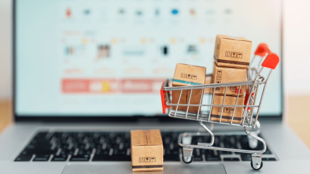 a shopping cart with miniature boxes