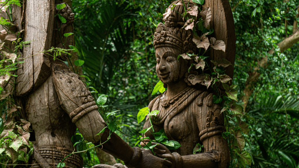 a tribe sculpture in forest