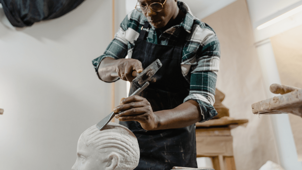 a man doing a sculpture