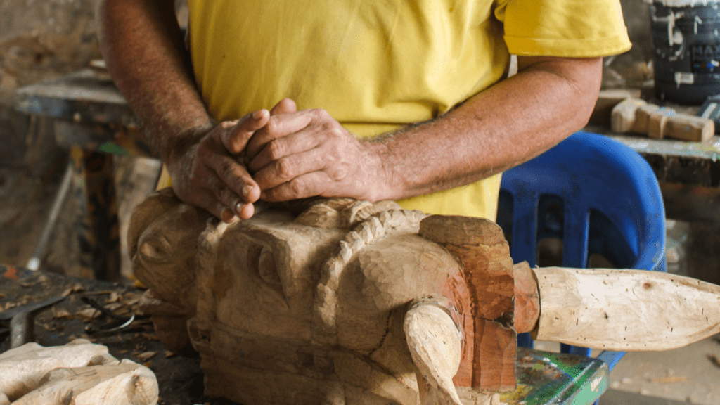 a man doing wood carving