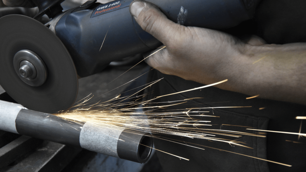  a man polishing a metal