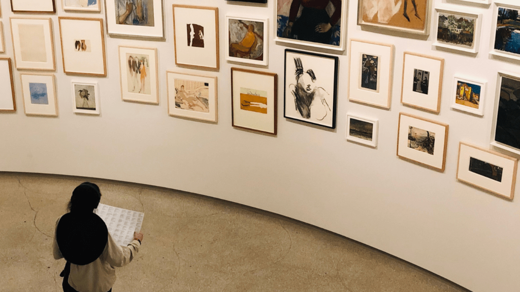 a man visiting a local art gallery
