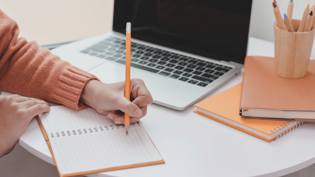 a man writing a blog