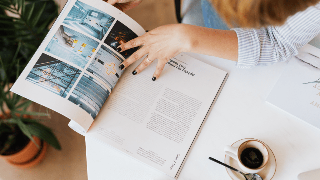 a woman reading a magazine