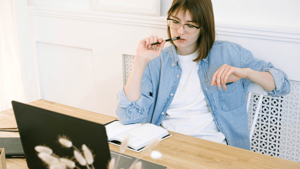 a woman writing a blog