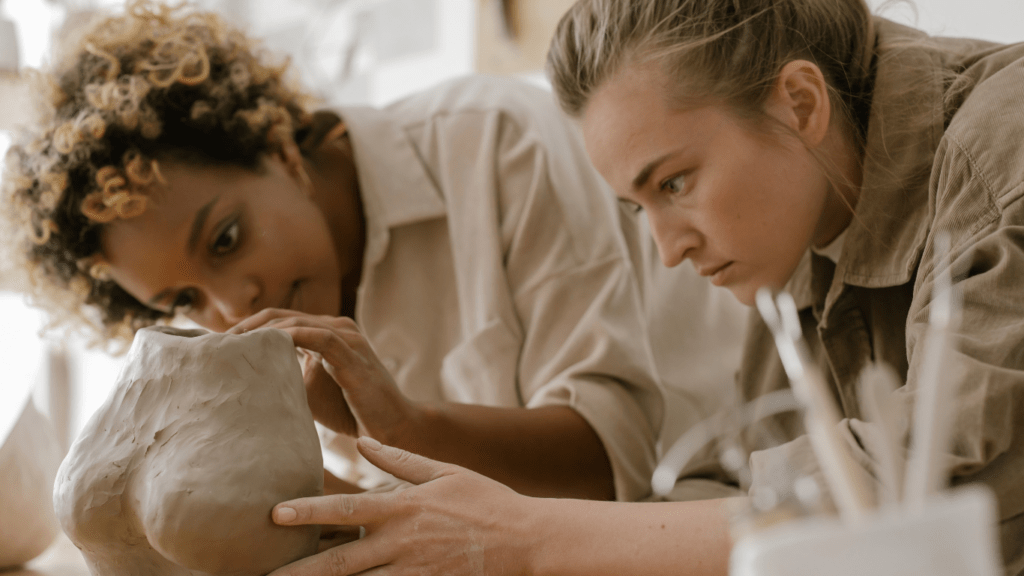 two woman in a sculpting class